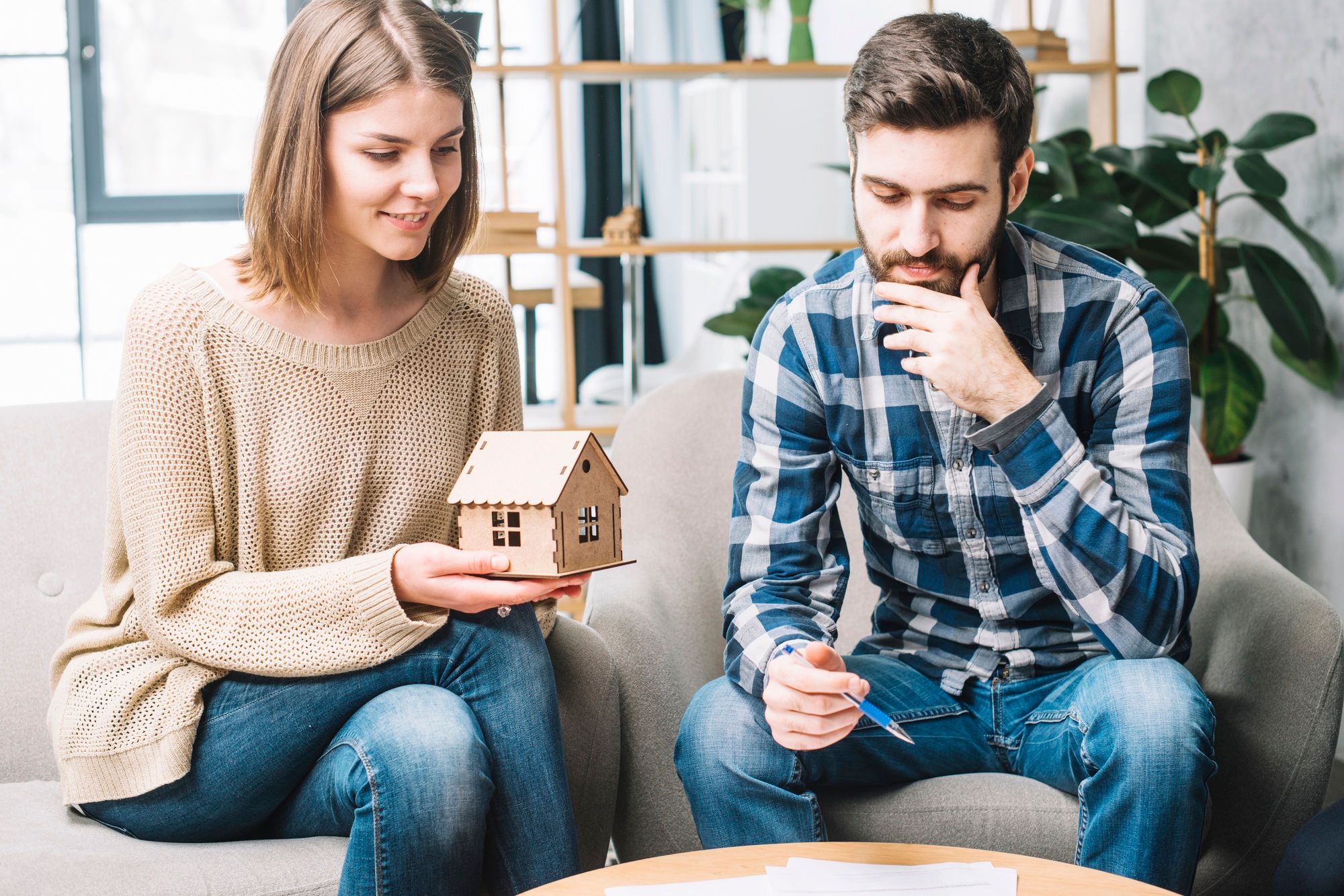 young-couple-thinking-mortgage (1).jpg