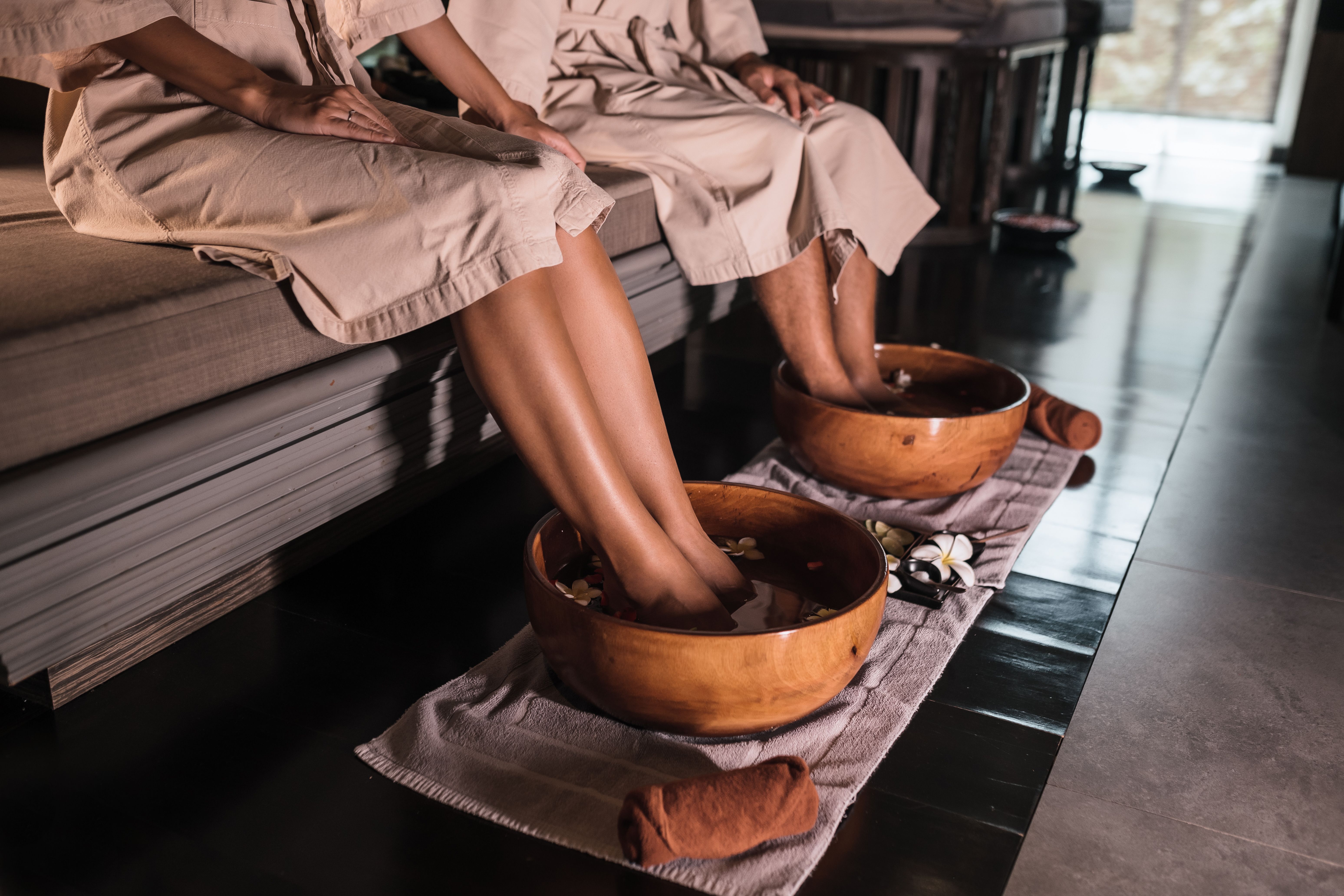 young-couple-dipping-their-feet-bowl-spa.jpg